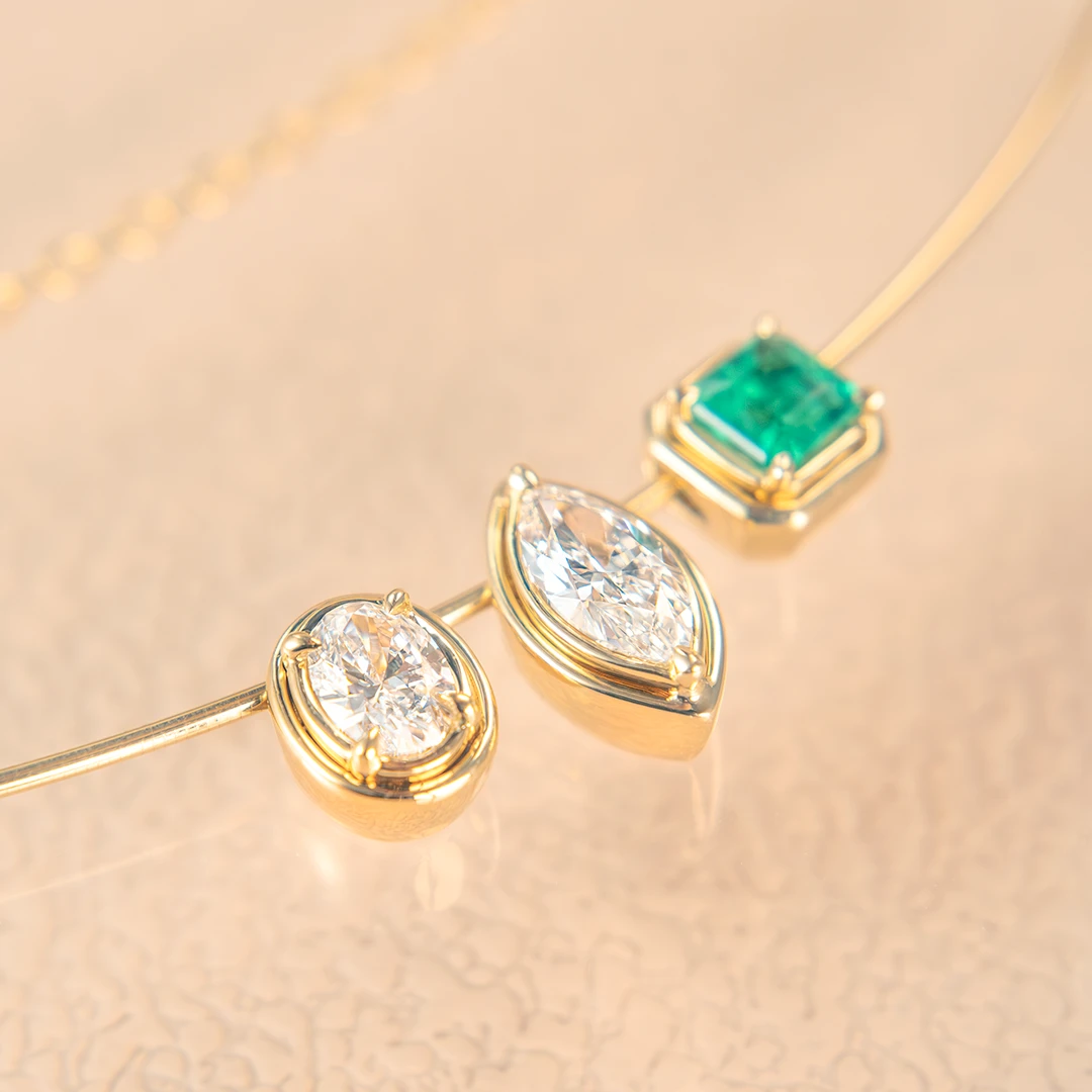 Honey bezel emerald pendant